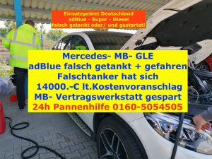 Auto mit adblue falsch getankt adac hat Falschtanker an uns vermittelt Bild Mechaniker beim absaugen mit Werbung bzw Notrufnummer 01605054505 für Falschtanker